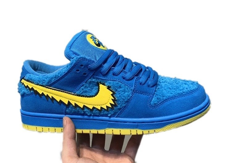 נעליי נייק-NIKE SB DUNK LOW PRO QS - Blue & Yellow Logo